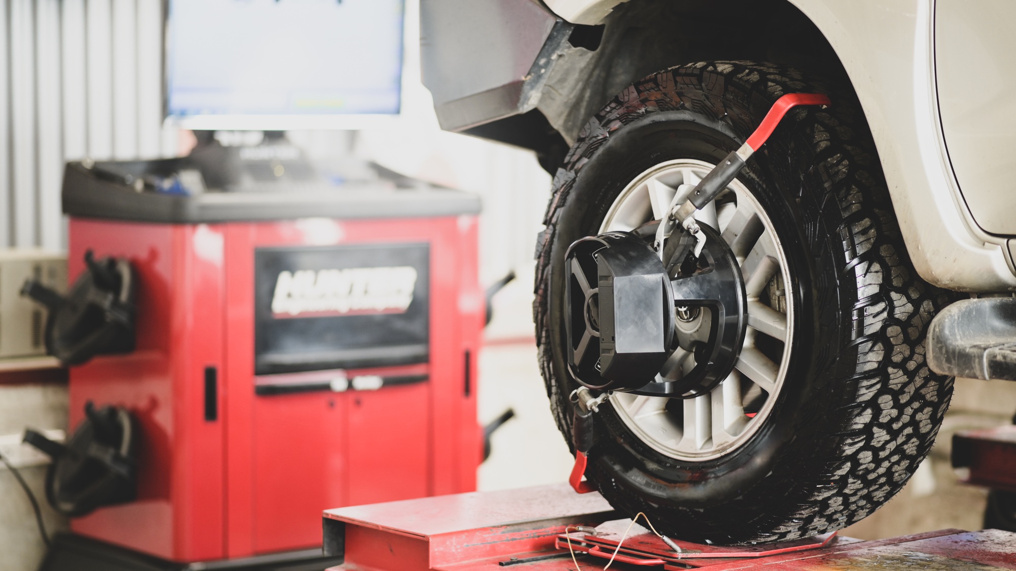 Car wheel alignment, car care, car suspension check.